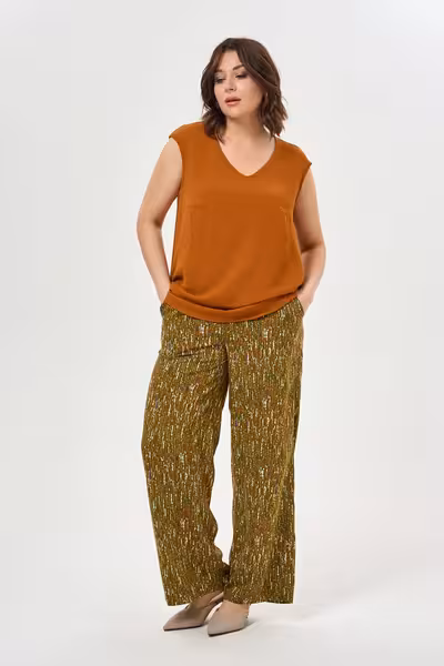 Широкие прямые брюки женские зеленые с пайетками